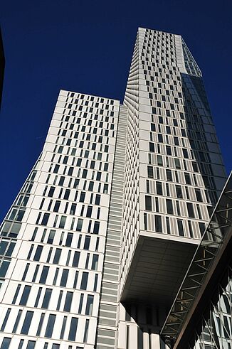 Façade with many small windows of the NEXTOWER, the landmark in the Palaisquartier in the Frankfurt skyline. 